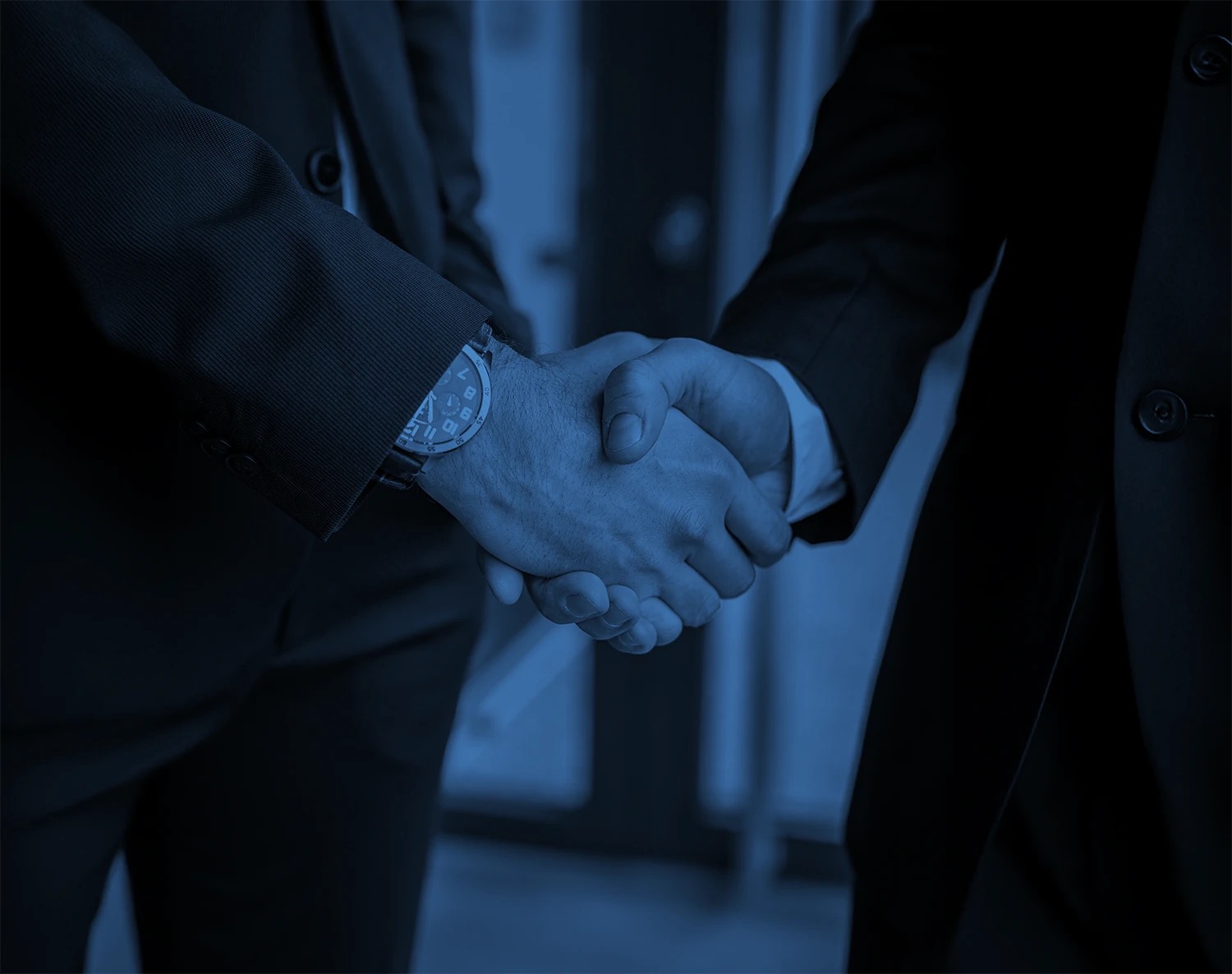 Handshaking representing collaboration and work